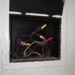 An old junction box with old and older wiring. Scary.